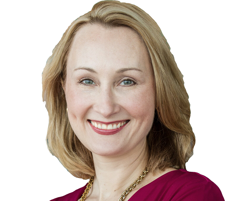 Head-and-shoulders portrait of Tasha Kheiriddin, shoulder-length blonde hair, wearing a maroon top and a gold necklace.